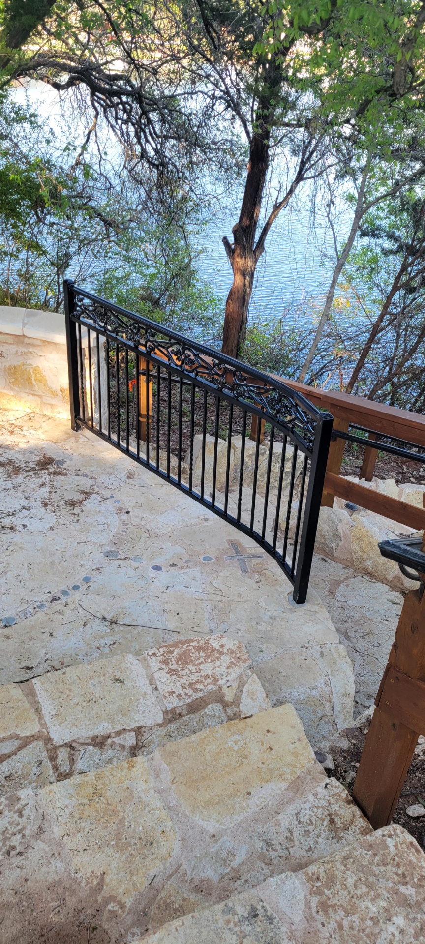 Custom decorative metal gate built and installed by All Around Fencing near Lake Granbury